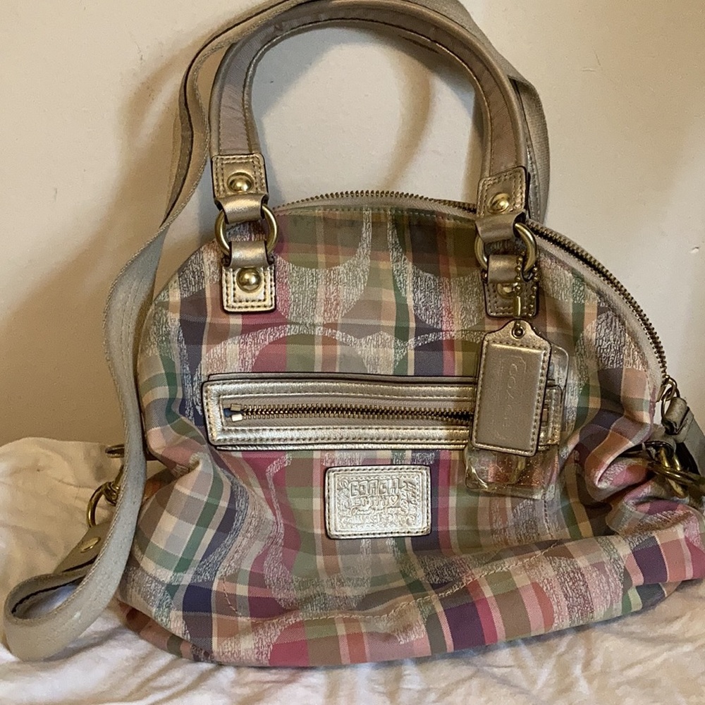 Coach handbag with shoulder strap and hand straps
